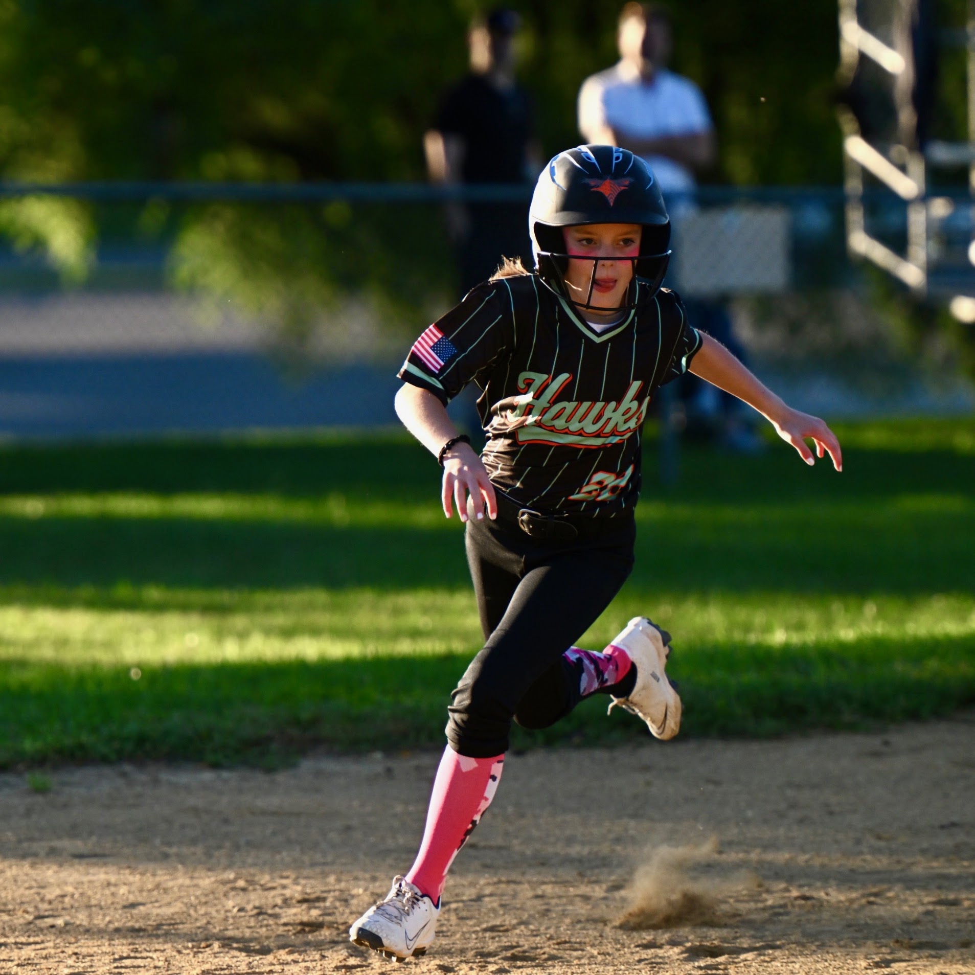 Reese running the bases in a softball game.